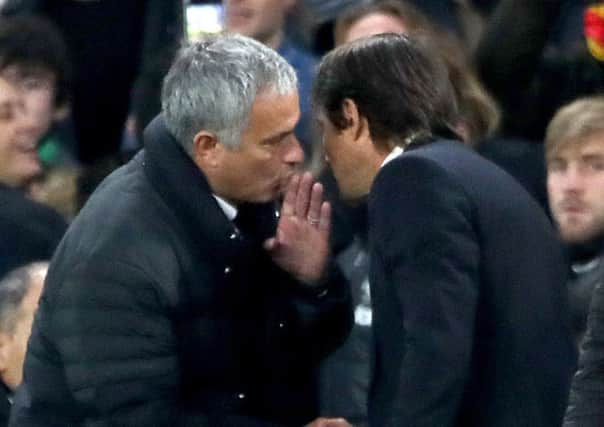 Chelsea manager Antonio Conte (right) shakes hands with Manchester United manager Jose Mourinho.