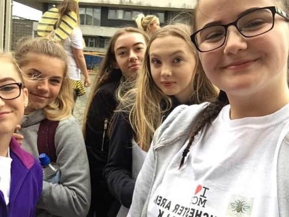 Tamzin Wilkinson-Summers (right) with friends on a sponsored walk in memory of Megan Hurley, who died in the attack at the Ariana Grande concert