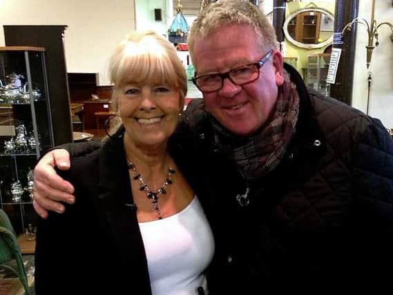 Sue Shalloe owner of Preston Antiques Centre in New Hall Lane which has been running for 30 years pictured with Antique Road Trip presenter Philip Serrell