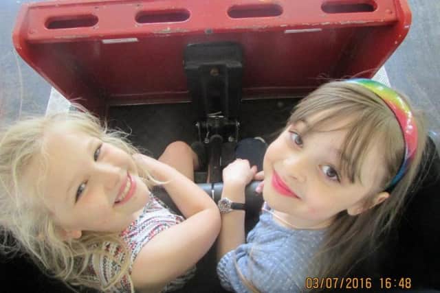 Saffie Roussos and Grace Swanson on a ride together