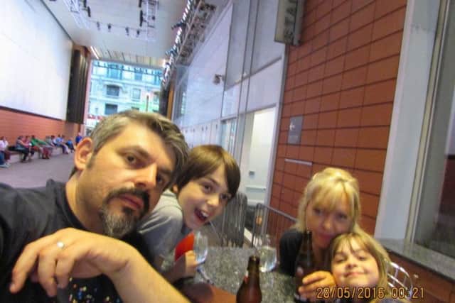 Andrew Roussos with wife Lisa and children Saffie and Xander