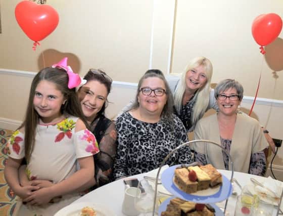 From left, Hannah (9) and Linzi O'Donnell, Mandy White, Gillian Hinchcliffe and Lorraine Hodson at the Heartbeat Afternoon Tea and Charity Evening at Preston Marriott Hotel