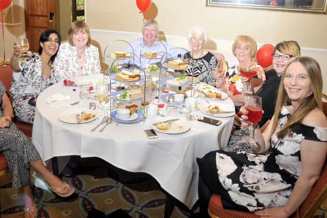 From left, Georgina Wilcox, Meral Dawe, Claire Khodna, Mike, Mary and Sue Wells, Carrie Crossley and Sarah Saward at the Heartbeat Afternoon Tea and Charity Evening