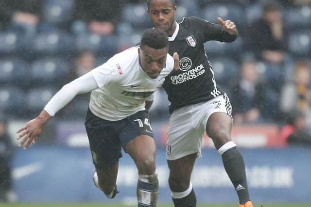 Darnell Fisher gets ahead of Fulham's Ryan Sessegnon
