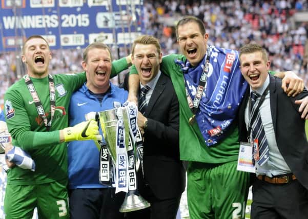 Sam Johnstone (left) with Alan Kelly, Jamie Jones, Thorsten Stuckmann and Steve James at Wembley after PNE's play-off final win in 2015