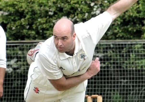 Fulwood and Broughton bowler Chris Brookes in action against Preston (photo: Julian Brown)