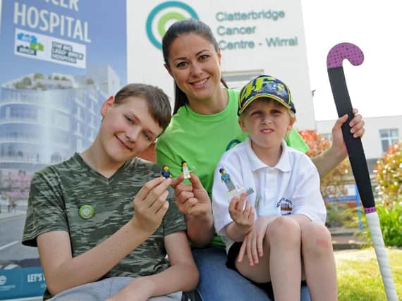 Reece Holt, Sam Quek and Taylor Seddon take part in the Clatterbridge Buy a Brick campaign.
