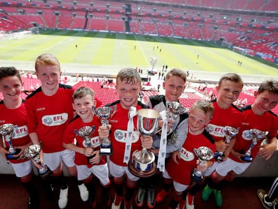 St Peter's Primary school collect the trophy in the Royal Box at Wembley
Photo by Kieran McManus/BPI/REX/Shutterstock