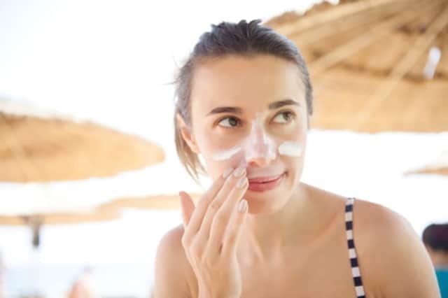 It's important to protect your face from the sun's rays, as well as your body (Photo: Shutterstock)