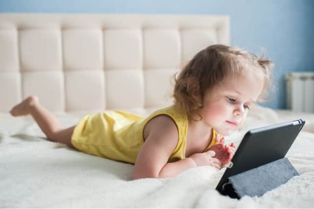 Parents could be damaging the mental health of toddlers by allowing them onto social media from the age of two (Photo: Shutterstock)